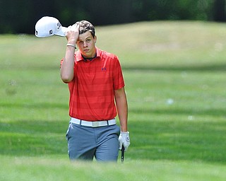 Howland's Joey Vitali reacts to his performance on the ninth hole during Wednesday's 2016 Flynn Auto Group Junior Greatest Golfer of the Valley tournament Wednesday at Mill Creek South Course. Vitali placed U-17...--Jeff Lange | The Vindicator  WED, JUN 29, 2016