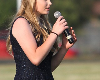 Nikos Frazier | The Vindicator..Kaleigh Saunders, sings the national anthem at the 2016 Battle of the Border.