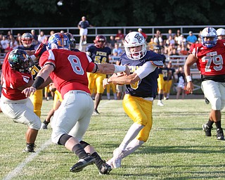 Nikos Frazier | The Vindicator..Pennsylvania's Austin Konieczka(3) pushes off Austyn Dozier(8) in the first quarter of the 2016 Battle of the Border at Springfield High School in New Middleton.