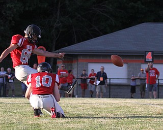 Nikos Frazier | The Vindicator..Max Righetti(86), successfully kicks a field goal in the first quarter of the 2016 Battle of the Border at Springfield High School in New Middleton.