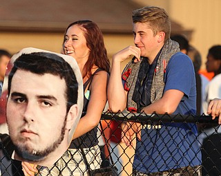 Nikos Frazier | The Vindicator..Katie Hannan and Jarrett Parker of Pittsburgh hold a fat head at the 2016 Battle of the Border at Springfield High School in New Middleton.
