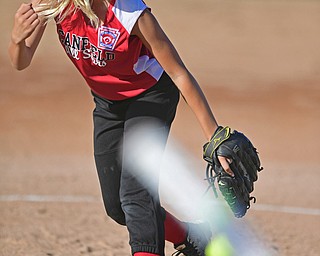 BOARDMAN, OHIO - JUNE 30, 2016: Pitcher Bella Kennedy(3) of Canfield pitches in the third inning of the District 2 softball championship game versus Boardman at the Field of Dreams. DAVID DERMER | THE VINDICATOR