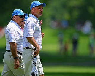 AKRON, OHIO - JULY 1, 2016: Jeff Overly of Boardman, walks on to the 14th green at Firestone Country Club, Friday afternoon. Overly represented Stryker as a Honorary Observer, after having a total knee replacement in December of 2014. DAVID DERMER | THE VINDICATOR