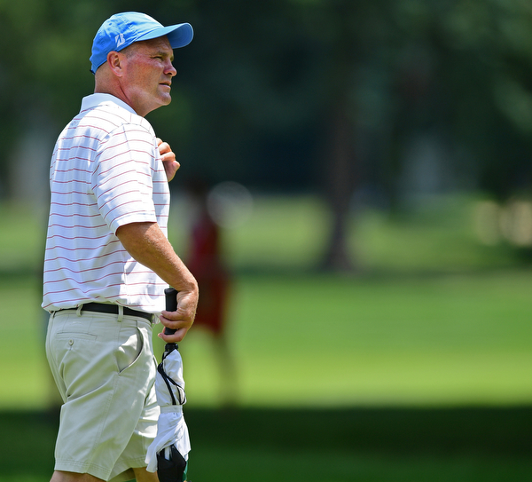 AKRON, OHIO - JULY 1, 2016: Jeff Overly of Boardman, walks on to the 14th green at Firestone Country Club, Friday afternoon. Overly represented Stryker as a Honorary Observer, after having a total knee replacement in December of 2014. DAVID DERMER | THE VINDICATOR