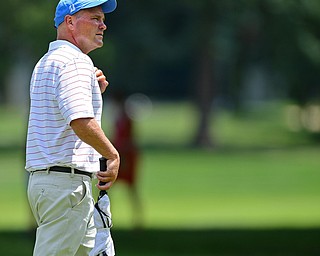 AKRON, OHIO - JULY 1, 2016: Jeff Overly of Boardman, walks on to the 14th green at Firestone Country Club, Friday afternoon. Overly represented Stryker as a Honorary Observer, after having a total knee replacement in December of 2014. DAVID DERMER | THE VINDICATOR