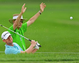 AKRON, OHIO - JULY 1, 2016: Vaughn Taylor chips out of a bunker on the 14h hole, Friday afternoon during the second round of the Bridgestone Invitational at Firestone Country Club. DAVID DERMER | THE VINDICATOR