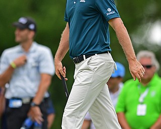 AKRON, OHIO - JULY 1, 2016: Justin Rose exhales in frustration after his putt came up short on the 12th hole, Friday afternoon during the second round of the Bridgestone Invitational at Firestone Country Club. DAVID DERMER | THE VINDICATOR