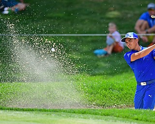 AKRON, OHIO - JULY 1, 2016: Rickie Fowler unsuccessfully chips out of a bunker on the 16th hole, Friday afternoon during the second round of the Bridgestone Invitational at Firestone Country Club. DAVID DERMER | THE VINDICATOR