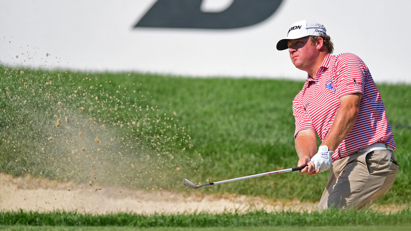 AKRON, OHIO - JULY 1, 2016: William McGirt chips out of a bunker on the 18th hole, Friday afternoon during the second round of the Bridgestone Invitational at Firestone Country Club. DAVID DERMER | THE VINDICATOR