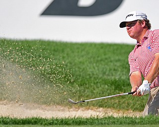 AKRON, OHIO - JULY 1, 2016: William McGirt chips out of a bunker on the 18th hole, Friday afternoon during the second round of the Bridgestone Invitational at Firestone Country Club. DAVID DERMER | THE VINDICATOR