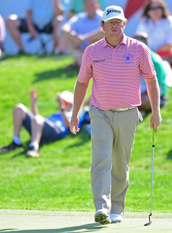 AKRON, OHIO - JULY 1, 2016: William McGirt  exhales in frustration after a double bogey on the 18th hole, Friday afternoon during the second round of the Bridgestone Invitational at Firestone Country Club. DAVID DERMER | THE VINDICATOR