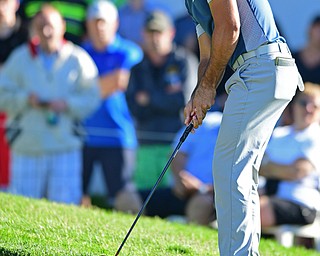 AKRON, OHIO - JULY 1, 2016: Jason Day putts on the 18th hole, Friday afternoon during the second round of the Bridgestone Invitational at Firestone Country Club. DAVID DERMER | THE VINDICATOR