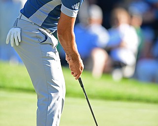 AKRON, OHIO - JULY 1, 2016: Jason Day putts on the 18th hole, Friday afternoon during the second round of the Bridgestone Invitational at Firestone Country Club. DAVID DERMER | THE VINDICATOR