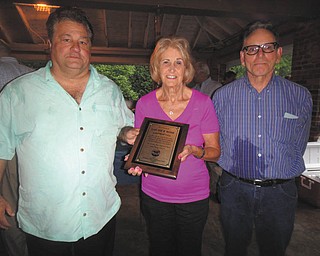 SPECIAL TO THE VINDICATOR
From left, are Dan Polivka, Diane Alejars, and Cosmo Signorello, who participated in a ceremony to honor Louise Rose at a recent Trumbull Democratic party meeting. The plaque will be delivered to the Rose family. Rose served as a party precinct member, worked at the polls and said she never missed the opportunity to vote.
