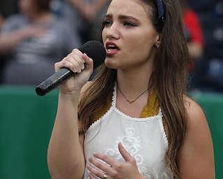Nikos Frazier | The Vindicator..Abigail Roberts of Howland sings the national anthem at the July 4, 2016 Scrappers game at Eastwood Field.