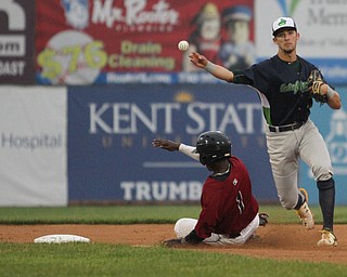 Nikos Frazier | The Vindicator..Scrappers Gabriel Mejia(1) slides into second base after Lake Monster Second Baseman, Eli White(27), tags him out at the base and throws to first for the out.