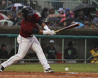 Nikos Frazier | The Vindicator..Scrappers Jodd Carter(7) swings and deflects the ball towards the dirt in the first inning against the Lake Monsters.