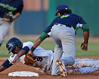 NILES, OHIO - JULY 5, 2016: Base runner Silento Sayles #9 of the Scrappers is tagged out by short stop Jesus Lopez #9 of the Lake Monsters to end the second inning of Tuesday nights game at Eastwood Field. DAVID DERMER | THE VINDICATOR