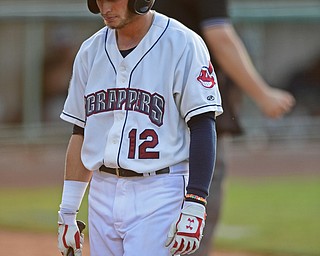 NILES, OHIO - JULY 5, 2016: Batter Alexis Pantoja #12 of the Scrappers walks to the dugout after striking out swinging in the fifth inning of Tuesday nights game at Eastwood Field. DAVID DERMER | THE VINDICATOR