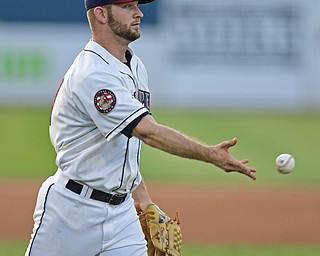 NILES, OHIO - JULY 5, 2016: Relief pitcher Dace Kime #51 of the Scrappers flips the ball to first after Luis Barrera #16 of the Lake Monsters grounded out to the pitcher in the sixth inning of Tuesday nights game at Eastwood Field. DAVID DERMER | THE VINDICATOR