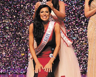 Heather Fronk of Austintown is crowned as Mrs. Ohio America on June 11 at the McCoy Theater of Arts in New Albany, near Columbus.