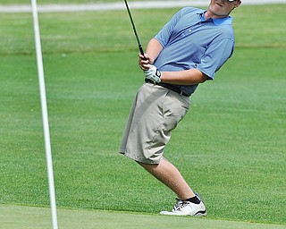 Matt Kinkela of New Wilimington attempts to coax his ball to the No. 10 hole during Wednesday's 2016 Flynn Auto Group Junior Greatest Golfer of the Valley tournament Wednesday at Mill Creek South Course. Kinkela placed U-17...--Jeff Lange | The Vindicator  WED, JUN 29, 2016
