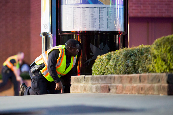 Dallas Police respond after shots were fired at a Black Lives Matter rally in downtown Dallas on Thursday, July 7, 2016. Dallas protestors rallied in the aftermath of the killing of Alton Sterling by police officers in Baton Rouge, La. and Philando Castile, who was killed by police less than 48 hours later in Minnesota. (Smiley N. Pool | The Dallas Morning News via AP)