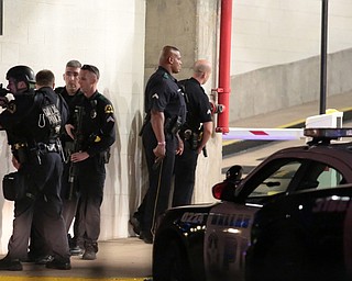Dallas police respond after shots were fired  during a protest over recent fatal shootings by police in Louisiana and Minnesota, Thursday, July 7, 2016, in Dallas. Snipers opened fire on police officers during protests; several officers were killed, police said. (Maria R. Olivas | The Dallas Morning News via AP)