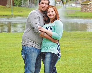 CODY A. WOOLEY AND BRITTANY R. MONAHAN
