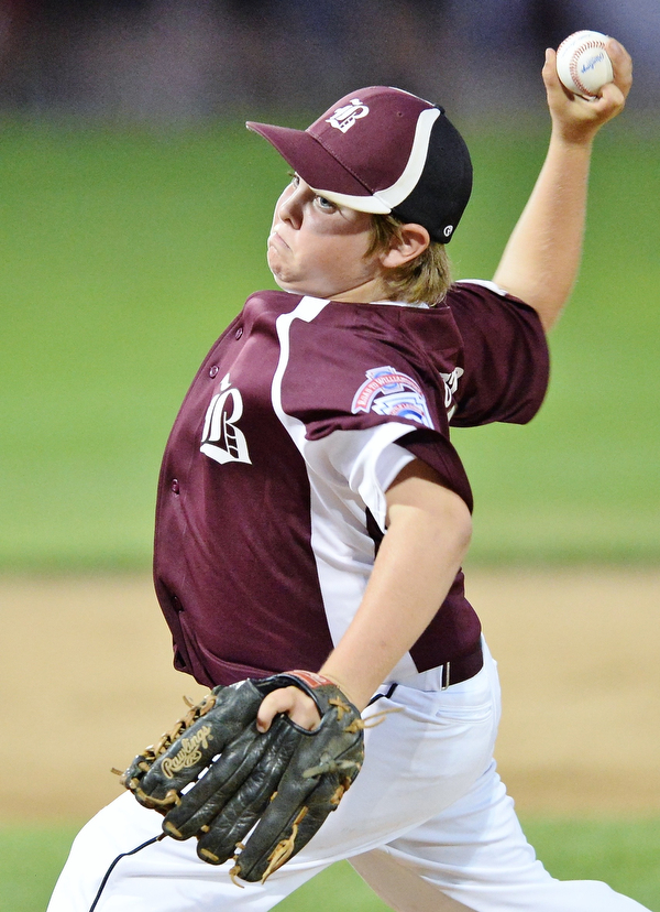 Jeff Lange | The Vindicator  MON, JUL 11, 2016 - Boardman starting pitcher Anthony Butto delivers a pitch to a Canfield batter in the first inning of Monday's game at Field of Dreams in Boardman.