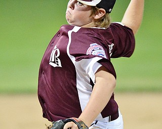 Jeff Lange | The Vindicator  MON, JUL 11, 2016 - Boardman starting pitcher Anthony Butto delivers a pitch to a Canfield batter in the first inning of Monday's game at Field of Dreams in Boardman.