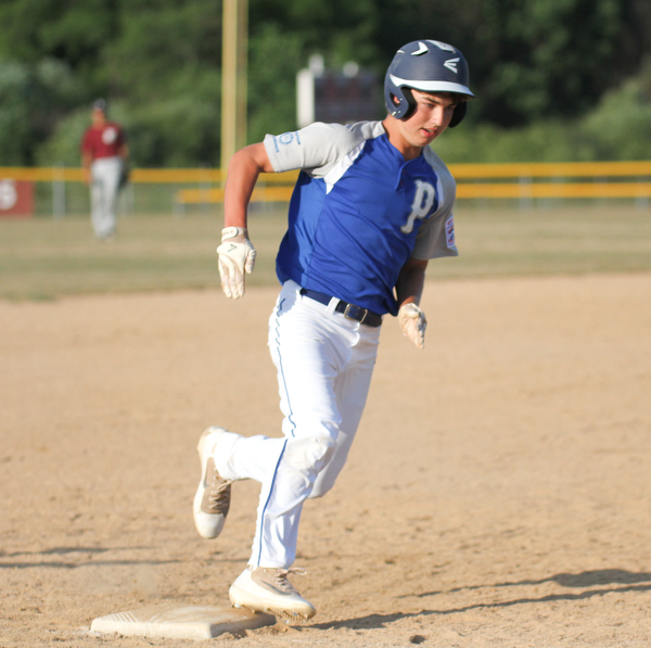 William D. Lewis The Vindicator Poland's Bailey Swogger rounds  thrid during July 12, 2016 game with Boardman at Field Of Dreams.