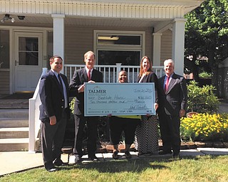 SPECIAL TO THE VINDICATOR
Talmer Bank and Trust recently donated $10,000 to Beatitude House, which will benefit Beatitude’s transitional housing program for disadvantaged women and children. Beatitude provides educational opportunities and helps to foster healthy families by providing safe places to live. Talmer’s donation will be used for renovations and upgrades to the House of Blessing sites in Youngstown and Warren and also will offer financial literacy programs at the housing sites. Joe Noss, left, and Bob Kempe of Talmer Bank presented the donation to Edie Smith and Jennifer Gray of Beatitude House, with assistance from Mark Wenick of Talmer.