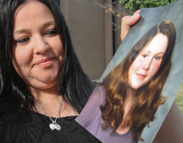 William D. Lewis/The Vindicator Shannon Pappas holds  photo of her daughter Maddison who died unexpectedly recently. She was a Fitch HS student.