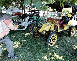        ROBERT K. YOSAY  | THE VINDICATOR..Vintage 1 and 2 stroke engines are on tour in the Mahoning Valley - Bill Lape of Pittsburgh photographs the vintage Renaults..... - -30-...