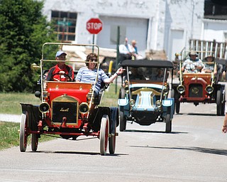        ROBERT K. YOSAY  | THE VINDICATOR..Vintage 1 and 2 stroke engines are on tour in the Mahoning Valley - cruise down Newton St in Canfield.... 42nd  national 1& 2 cylinder tour - -30-...