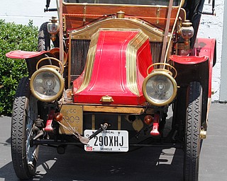        ROBERT K. YOSAY  | THE VINDICATOR..1909 Renault  hand crank start..Vintage 1 and 2 stroke engines are on tour in the Mahoning Valley - cruise down Newton St in Canfield.... - -30-..42nd  national 1& 2 cylinder tour .