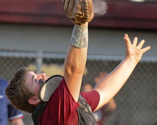 William D.Lewis/The Vindicator  Boardman catcher Colin rushen(16) looses control of a popup foul during July 13, 2016 game with Poland at Field of Dreams.