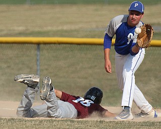 William D. Lewis/The Vindicator  Boardman's Joey Kordupel(18) gets back to the bag as Poland's Zachary Yaskolka(13) waits for the throw during July 13, 2016 game at Field of Dreams.