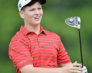 Jeff Lange | The Vindicator  THU, JUL 14, 2016 - Ryan Galle of Warren JFK watches his tee shot during Thursday's Greatest Golfer of the Valley Junior qualifier held at Trumbull Country Club in Warren.