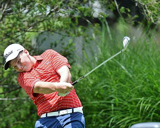Jeff Lange | The Vindicator  THU, JUL 14, 2016 - Warren JFK's Ryan Galle tees off down the No. 2 fairway during Thursday's Greatest Golfer of the Valley Junior qualifier held at Trumbull Country Club in Warren.