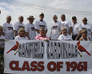 SPECIAL TO THE VINDICATOR
The Canfield High School class of 1961 celebrated the Fourth of July at the Canfield parade. Those attending included, in front from left, Donna Alexander, Jill Jones Raymer, Alta Miller Rowney, Marilyn Lytle Cashon and Janet Yeager Stanwood; and in back are Jack Dyckman, John Henry, Jim Alexander, Bill Brenner, Gary Koning, Doug Cashon, Eric Cahalin and Clyde Martz.