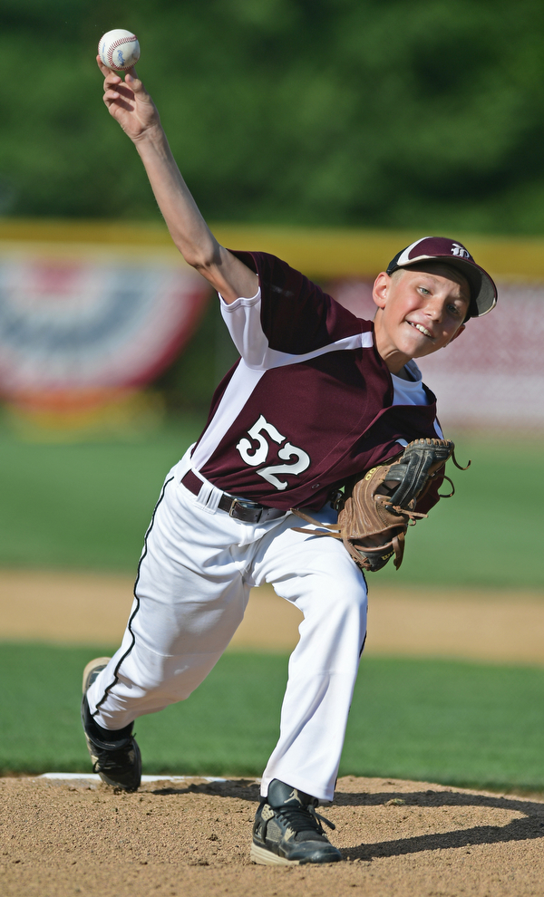 BOARDMAN, OHIO - JULY 15, 2016: Starting pitcher Jack Ericsson(52) of Boardman pitches in the first inning of Friday evenings District 2 9/10 year old Little League Championship game at the Field of Dreams. Boardman would go on to win 18-5. DAVID DERMER | THE VINDICATOR