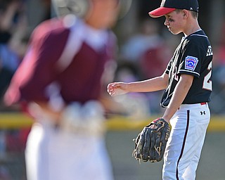 BOARD MAN, OHIO - JULY 15, 2016: Benjamin Herrmann(23) of Canfield shows his frustration after hitting a Boardman batter with the bases loaded in the second inning of Friday evenings District 2 9/10 year old Little League Championship game at the Field of Dreams. Boardman would go on to win 18-5. DAVID DERMER | THE VINDICATOR