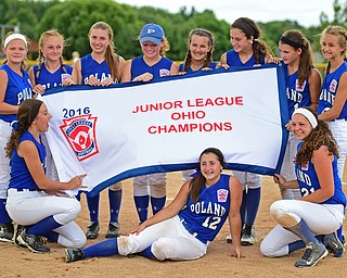 BOARDMAN, OHIO - JULY 18, 2016: The Poland Bulldogs pose for a picture with the championship banner after defeating Rock Hill  at the Field of Dreams Monday afternoon. DAVID DERMER | THE VINDICATOR