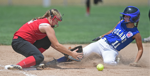 BOARDMAN, OHIO - JULY 18, 2016: Lexi Diaz #11 of Poland steals third base after third baseman Gracie Stevens #34 of Rock Hill did not field the ball cleanly in the second inning of Monday afternoons Little League Championship game at Field of Dreams. Poland won 12-2. DAVID DERMER | THE VINDICATOR