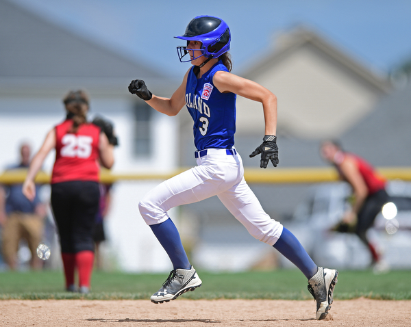 BOARDMAN, OHIO - JULY 18, 2016: Jackie Grisdale #3 of Poland sprints to second base while on her way to third for a RBI triple in the fourth inning of Monday afternoons Little League Championship game at Field of Dreams. Poland won 12-2. DAVID DERMER | THE VINDICATOR