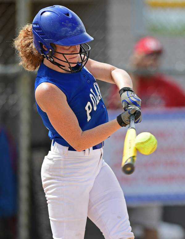 BOARDMAN, OHIO - JULY 18, 2016: Lauren Sienkiewicz #17 of Poland makes contact with the ball before flying out during her at bat in the fifth inning of Monday afternoons Little League Championship game at Field of Dreams. Poland won 12-2. DAVID DERMER | THE VINDICATOR