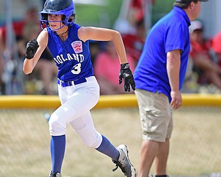 BOARDMAN, OHIO - JULY 18, 2016: Jackie Grisdale #3 of Poland sprints home to score after a failed pick off throw to third from the catcher in the sixth inning of Monday afternoons Little League Championship game at Field of Dreams. Poland won 12-2. DAVID DERMER | THE VINDICATOR