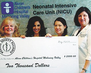 SPECIAL TO THE VINDICATOR
Representatives from the Mahoning County Medical Society Alliance presented a check for $2,000 to Dr. Elena Rossi, neonatologist and associate chairman of pediatrics at Akron Children’s Hospital Mahoning Valley for the hospital’s Safe Sleep Program. The funds were raised at MCMSA annual Champagne Brunch and Style Show. The sleep program includes outreach to expectant and new parents educating them on safe sleep practices. The alliance consists of physician spouses. From left are Joann Stock, senior director of development at Akron Children Hospital Mahoning Valley; Cristina Memo, alliance member; Diana McDonald, immediate past president of the alliance; and Dr. Rossi.

